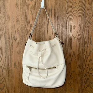 Fossil ivory leather drawstring bucket medium handbag